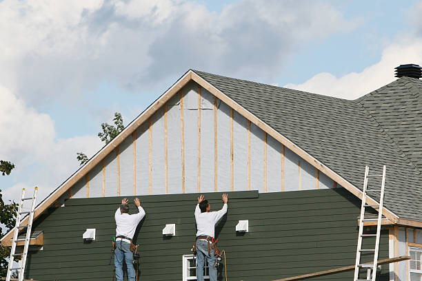 Professional Siding technician working in Huntsville, OH
